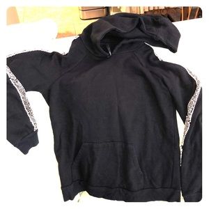 Joes jeans sweatshirt.  A few Stones are missing